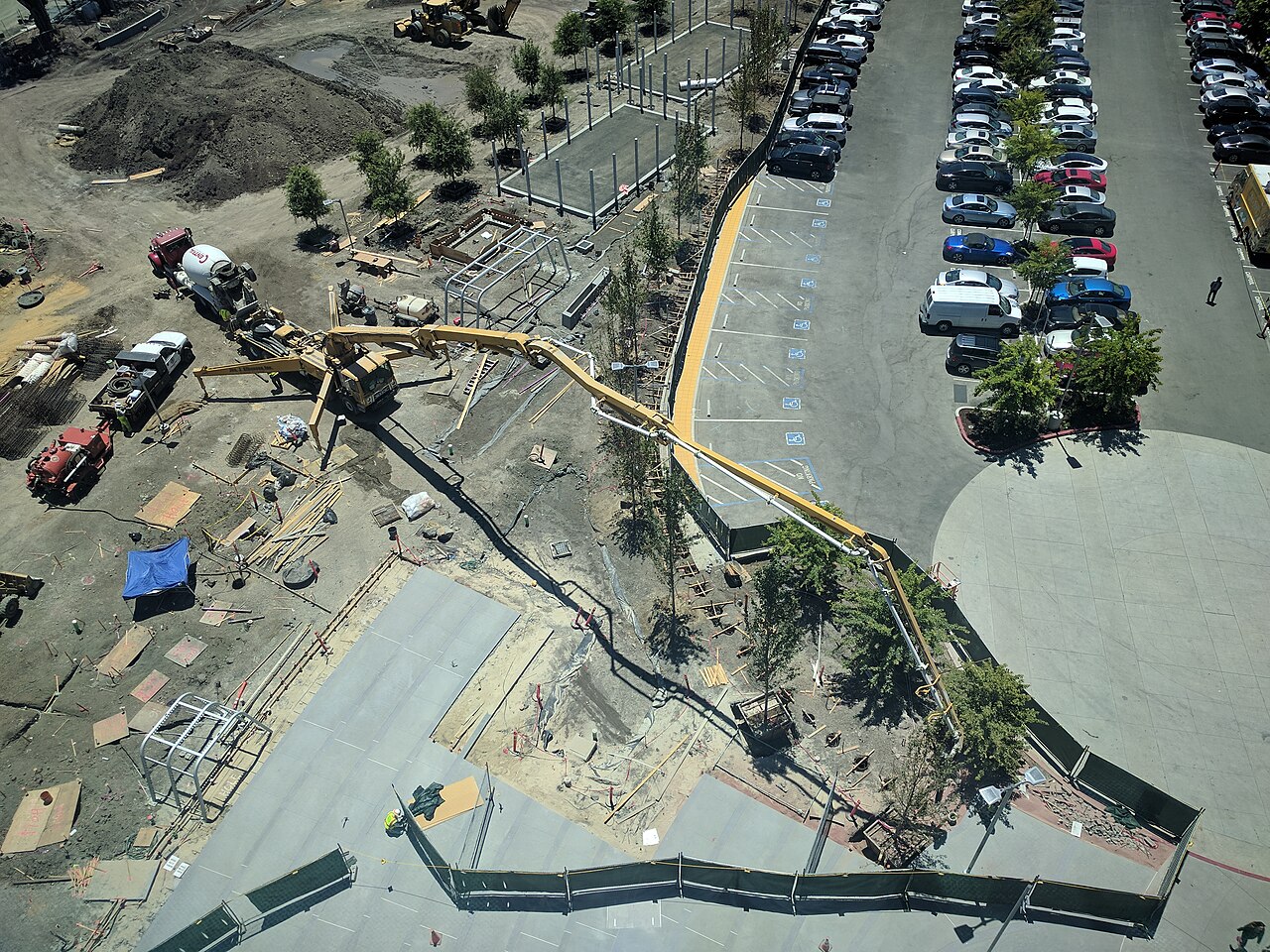Concrete mixer truck and pump truck at a jobsite