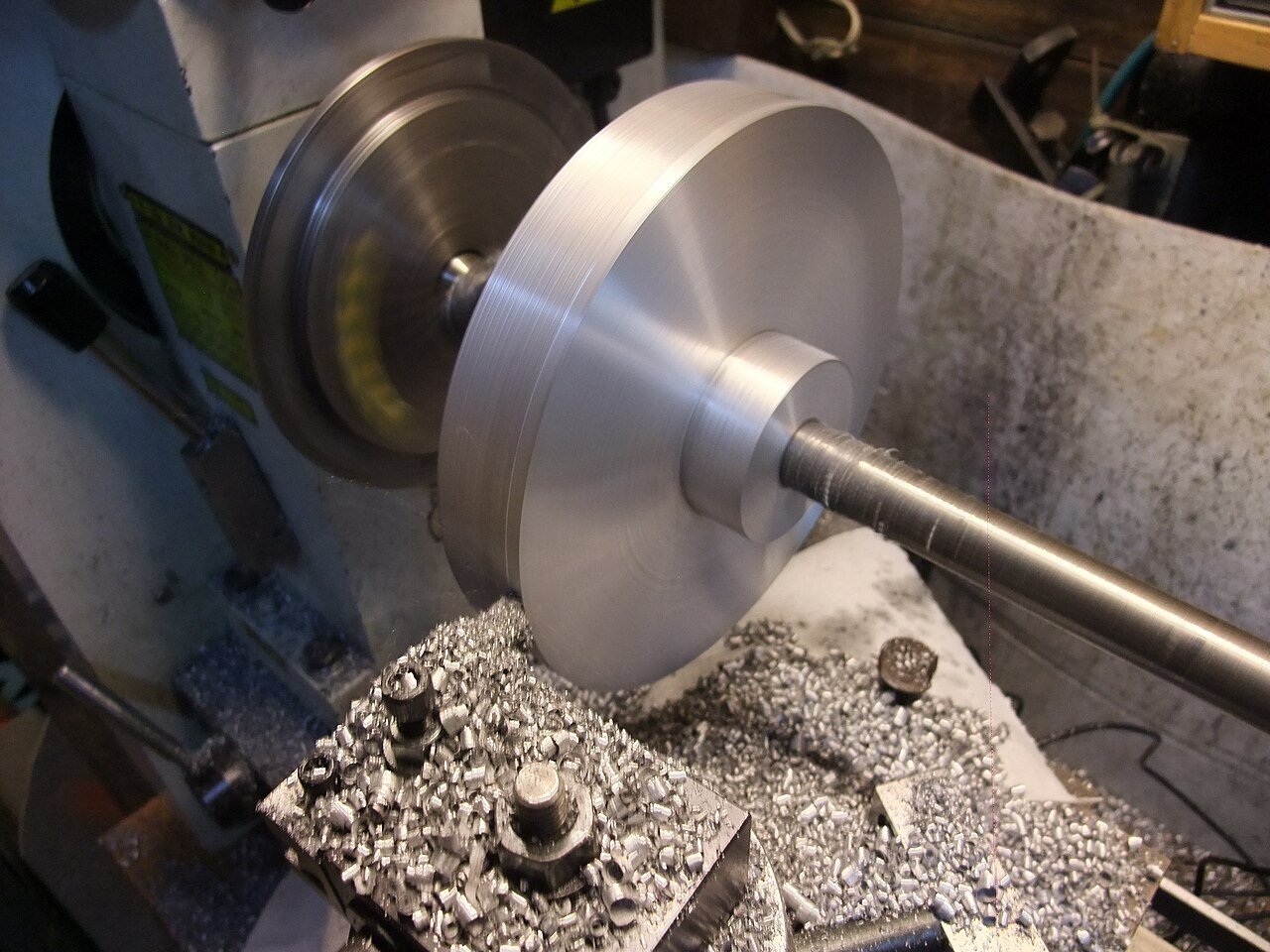 Metal lathe turning a workpiece
